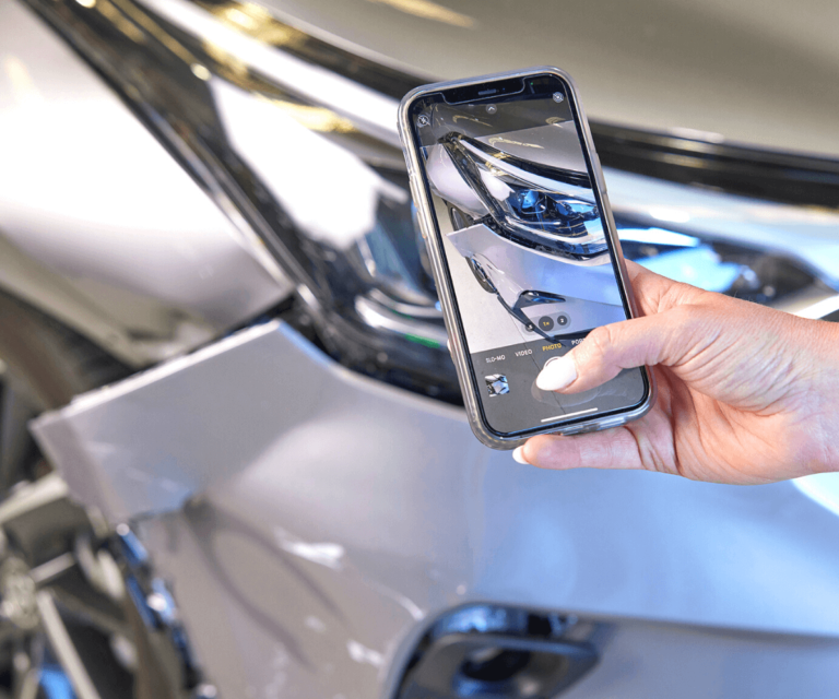 TAMMS photographing damaged car